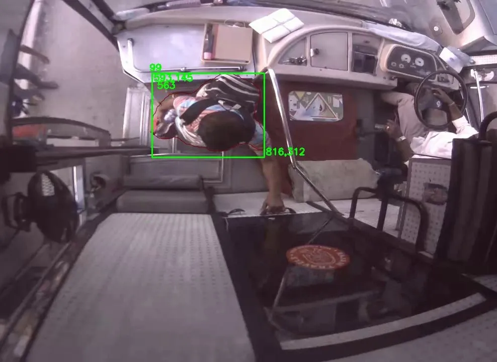 BusNet passenger detection in action — overhead view with bounding boxes on boarding passengers